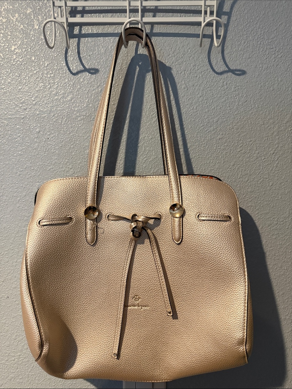 Nanette Lepore metallic champagne leather tote with drawstring